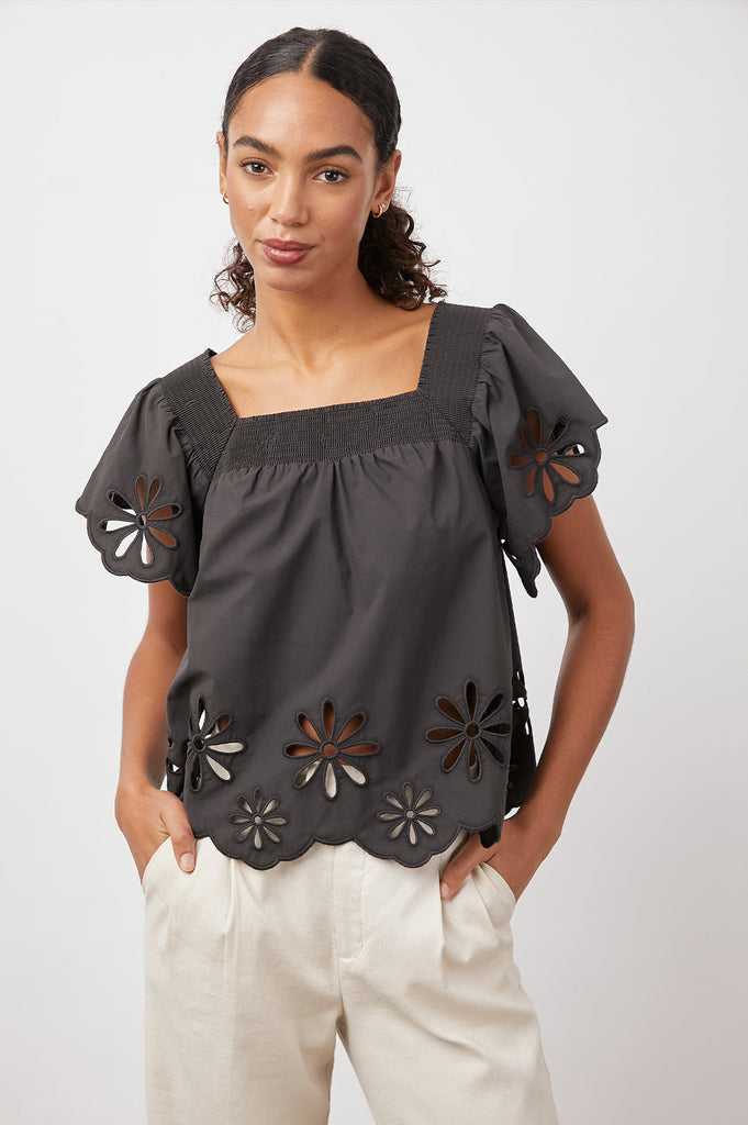 A Summer top with a difference!  The Sonora top from Rails features pretty flutter sleeves, is crafted from lightweight organic cotton poplin and has an incredibly flattering boxy shape with cut out details at the hem and sleeve.  Perfect paired with white denim.