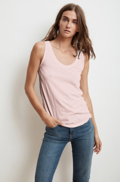 Crafted from Velvet by Graham & Spencer's signature whisper soft cotton slub this tank has an incredible texture and a flattering silhouette.  By cutting in slightly at the armholes you get to show off your shoulders!  With a slightly relaxed shape this will be a tank that spends very little time in your wardrobe. You'll want this in every colour!