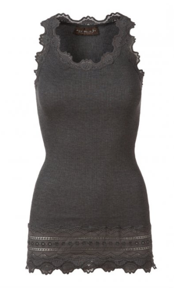 This scrumptiously soft silk and cotton vest from Rosemunde, features lace at the neck, arms and hem. With a slim fit and a nice long length this is the perfect layering piece with all your knitwear. Also available in other colours. 