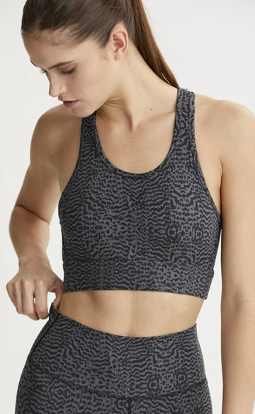 Comfortable fit combined with extra support makes the Berkeley Bra from Varley a great addition to your workout kit.  A classic racerback constructed from Varley's signature four-way stretch with moisture wicking fabric this will keep you cool no matter hard you're working.  With the added benefit of a back pocket to store your phone or other essentials you'll want this style in every colour.