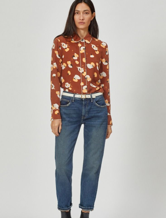 Gorgeous pyjama inspired shirt from Equipment.  Crafted from their signature super soft silk in a quirky print with piping and a button down front.  Pair with white denim to make the white in the print really pop!