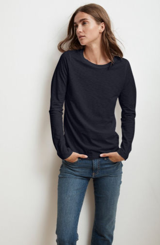 The perfect long sleeved tee from Velvet by Graham & Spencer.  Crafted from their signature super soft cotton slub this is a great tee on it's own and equally great for layering. Flawless fit and featuring a contrast band around the neckline and hemline that hits the hips in just the right spot.  You'll want this in every colour.