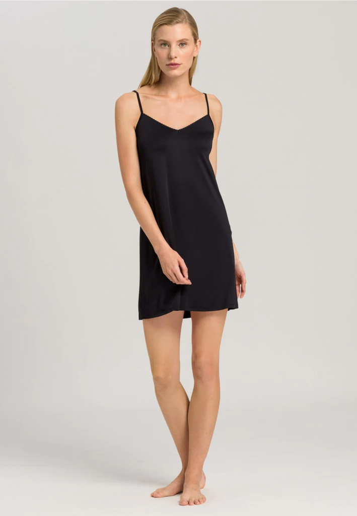 A slip is an essential item in every women's wardrobe!  The Satin Deluxe Bodydress from Hanro is perfect.  Crafted from super soft flowing viscose and a bit of elastane for stretch and featuring a gentle v neck this is just what you need under your clingier dresses and slips or wear it at home to lounge in.