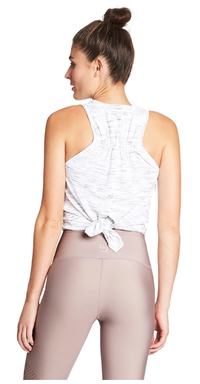 Nimble's most versatile performance tank. Knot it to secure in place or wear it loose for extra back ventilation.