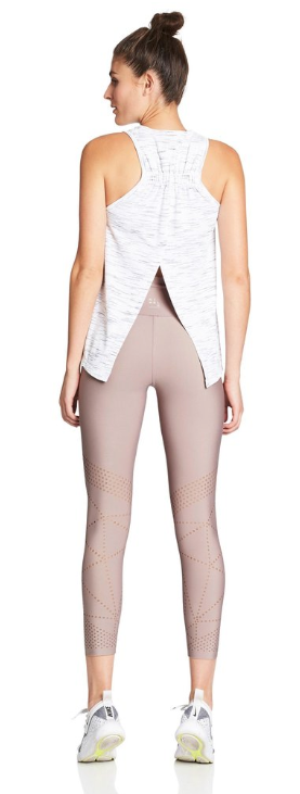 Nimble's most versatile performance tank. Knot it to secure in place or wear it loose for extra back ventilation.