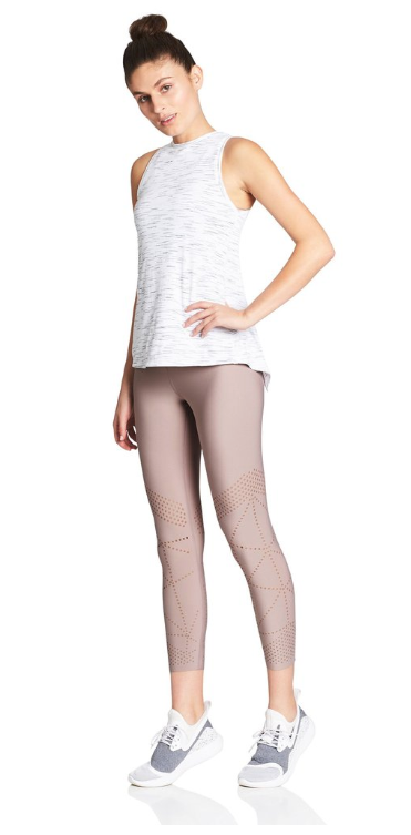 Nimble's most versatile performance tank. Knot it to secure in place or wear it loose for extra back ventilation.