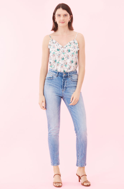 Tiny ruffles ripple along the sweetheart neckline of this silk tank.