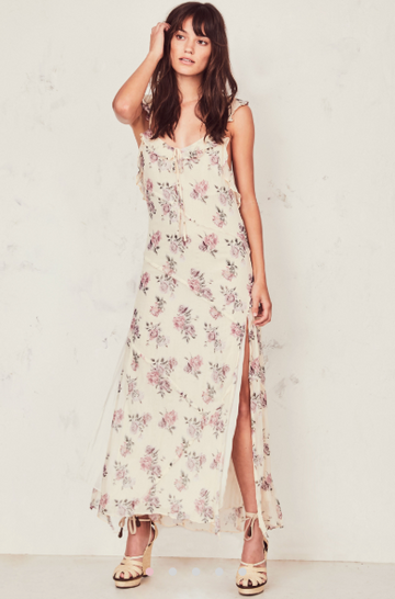 Reveal just enough in the Sally Dress in crinkle chiffon with hand-painted French roses. Our take on the classic slip dress has ruffles as straps, crossing with ties at back to expose skin. Raw-edged ruffles cascade below. A center front keyhole cinches with a tie, and a slit extends down the ankle-length skirt from mid-thigh. 