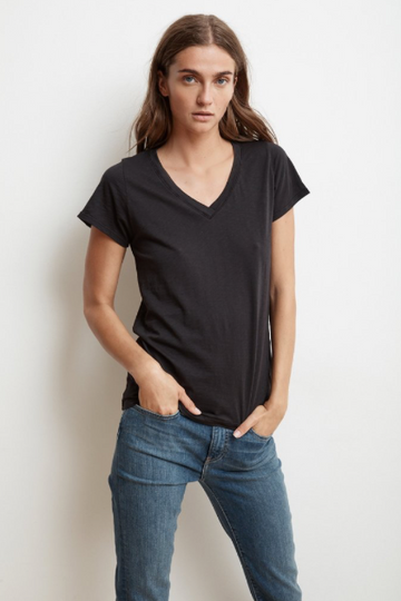 Another perfectly crafted tee from Velvet by Graham & Spencer.  The depth of the v, the softest cotton and a flattering silhouette combine to create a tee that you will want to wear almost daily. Shown here in classic black.