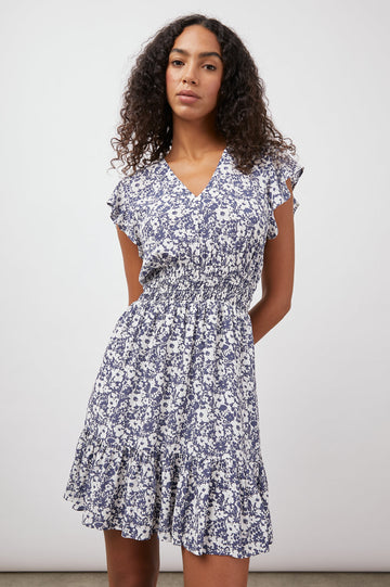 Super cute lightweight short sleeved dress from our favourite LA brand Rails.  With a flattering v neck, flutter cap sleeves, a smocked elasticated waist and feminine ruffle detail at the hem this is an incredibly easy dress to wear. Pair with your favourite trainers for a relaxed daytime look.