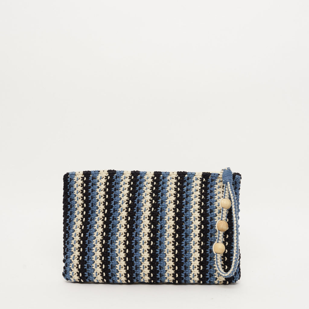 We are delighted to be stocking French brand Petite Mendigote.  This stylish macrame pouch features a wrist strap with bead detailing, an inside pocket and zip closure.    Use as a clutch and pair with the matching tote bag for all your shopping or holiday essentials!   