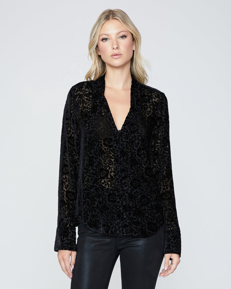 The Yvenna Blouse in black features long sleeves, a flattering v neck, covered buttons down the front, flared cuff sleeves and a tie front detail which can be either bowed or worn loose for an effortless vibe.  Looks perfect paired with the Paige Cindy with the luxe coating.