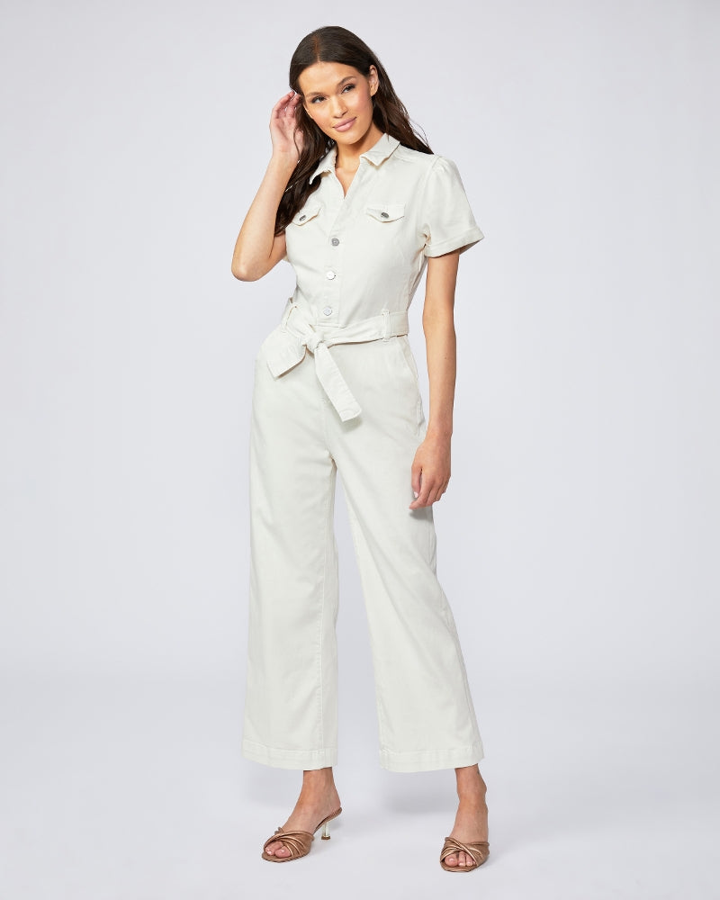 This stunning Anessa Jumpsuit is back in a flattering neutral for Spring/Summer. Featuring a cropped wide leg, a button front v-neckline and a quilted tie-up waist detail, this jumpsuit creates a flattering silhouette and a super long leg look and is one you'll reach for again and again. 