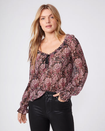 We love a Paige blouse and this one is just as lovely as we've come to expect!  Crafted from 100% silk georgette in a pretty floral print this ultra feminine top features romantic billowy sleeves, ruffle cuffs and a sweetheart neckline.  Looks perfect paired with the Paige Cindy with the luxe coating.