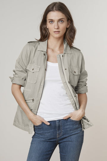 Our favourite Ruby jacket from Velvet by Graham & Spencer is back in a perfect neutral.  With a nod to a military trend this lightweight jacket will be one you reach for again and again.  Especially with our very changeable English weather.  Created from the softest of cottons it will feel perfectly worn from the first time you put it on.  A bit of rock and roll glamour to add to your favourite denim. 
