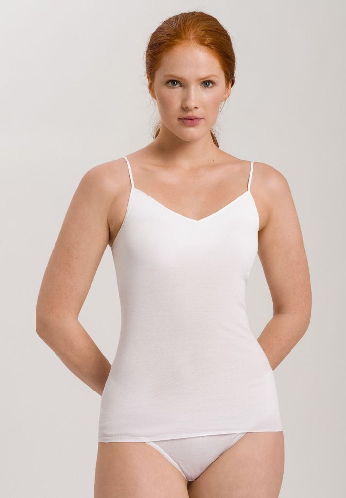 Crafted from super soft mercerised cotton and featuring a seamless and hem less design this little cami definitely deserves a place in your lingerie drawer.  With a satin trimmed neckline, adjustable satin straps and a neat fit this is a great layering piece.  You'll want it in every colour!