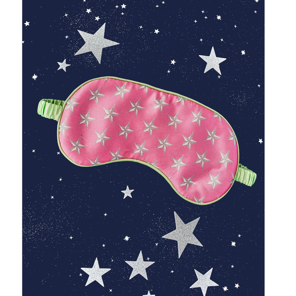 The super comfy padded blackout silk sleep mask from Jessica Russell Flint is crafted from the softest silk and will help guarantee a good night's sleep.  Shown here in the pretty Lucy's Blushing Stars print these make a super gift for a friend or a treat for yourself!