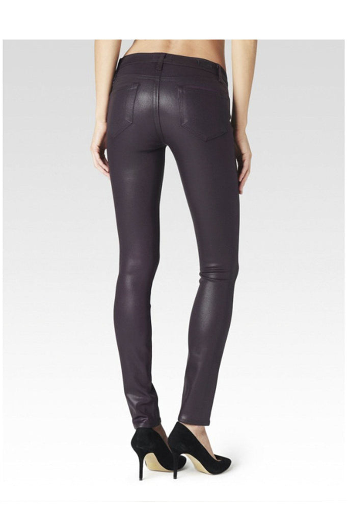 Paige's Verdugo Jean in Wine combines the brand's transcend fiber technology with a super gloss pigment that combines the look of leather with a silhouette that you can live in. The mid-rise Verdugo sits at the waist and fits through the hip, thigh and ankle for a true skinny fit. This denim is crafted with the luxe, Wine wax coating for a sleek look and true, rocker style.  52% Rayon 26% Cotton 18% Polyester 1% Spandex