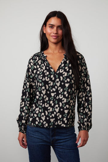 A classic relaxed shape from Velvet by Graham & Spencer this is a feel good top that is an easy to wear piece.  Cinched cuffs and a relaxed volume in the sleeves makes this a flattering top paired with your favourite denim.