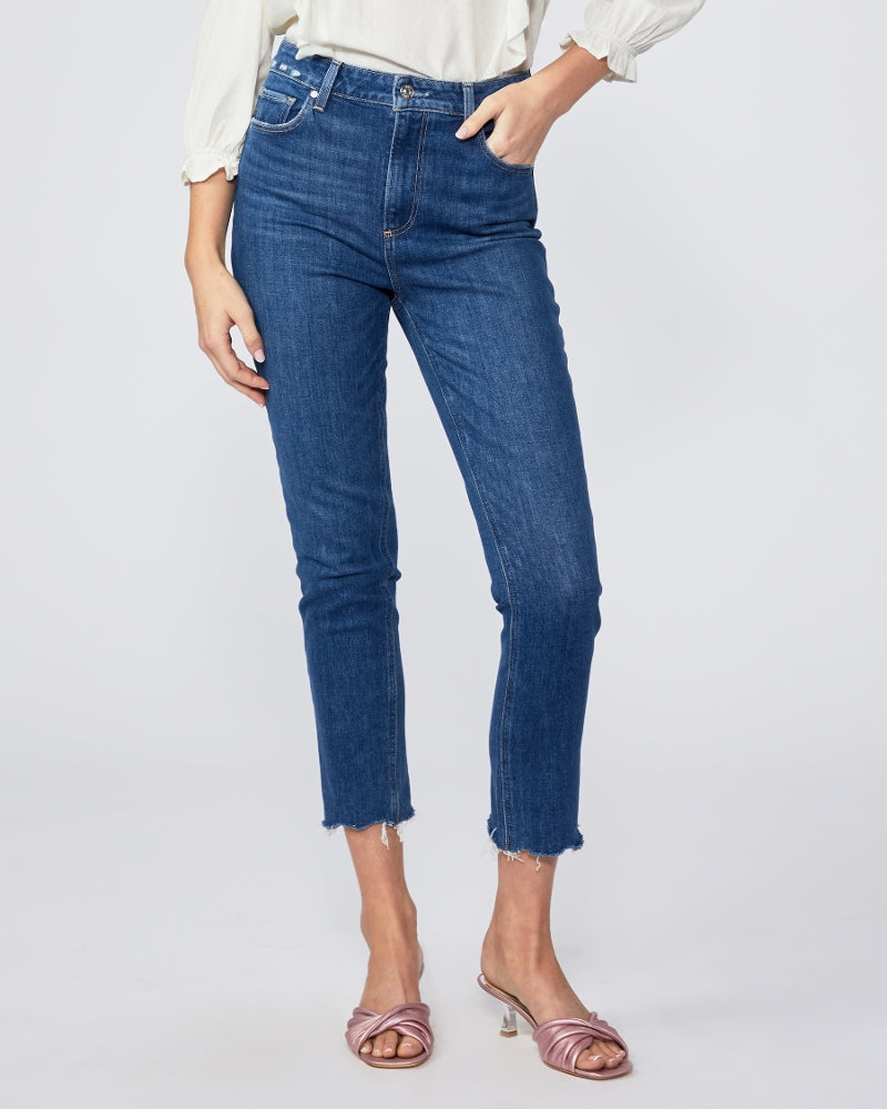 This slim and straight leg, high rise jean from Paige is crafted from a vintage medium wash denim and features natural whiskering and a raw, distressed hem. The comfort of stretch provides everything you love about authentic vintage denim. These super soft jeans feel perfectly lived-in from your very first wear.