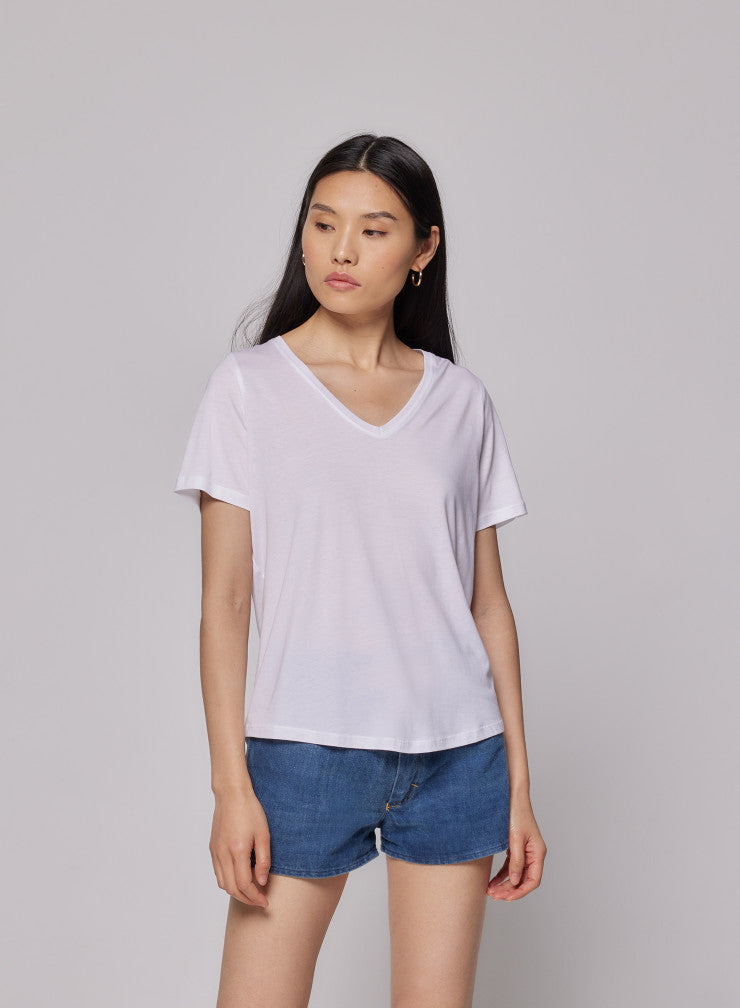 We are delighted to be stocking uber cool French basic brand Majestic Filatures.  This  t-shirt has a deep v-neck and is crafted from 67% lyocell and 33% cotton which makes it super soft and comfortable.  Lyocell is an eco-friendly fabric made from wood. A definite must have and we think you'll also want it in black!