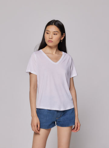 We are delighted to be stocking uber cool French basic brand Majestic Filatures.  This  t-shirt has a deep v-neck and is crafted from 67% lyocell and 33% cotton which makes it super soft and comfortable.  Lyocell is an eco-friendly fabric made from wood. A definite must have and we think you'll also want it in black!